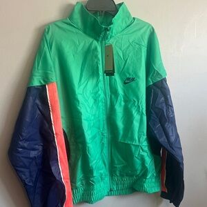 Nike Gianni Freak Teal and Navy Jacket with Coral Accents